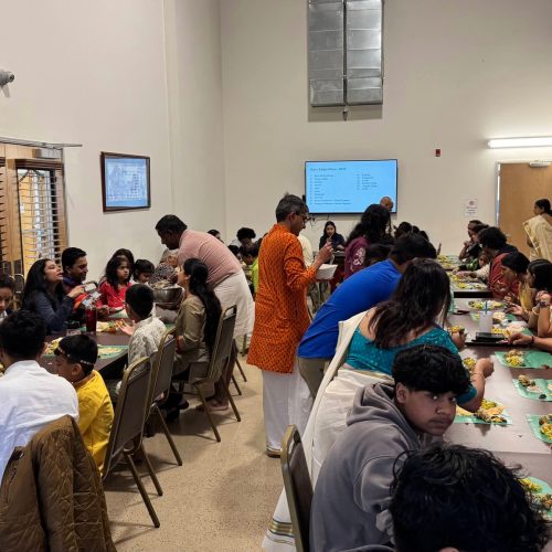 Serving at the Shadras Cafe